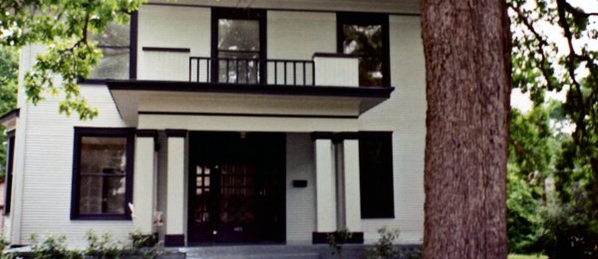 Exterior painting after — two-story home, East Texas